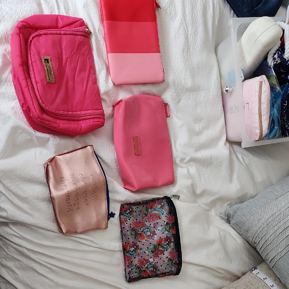 Uniqlo Pink and Floral Travel Bag Set